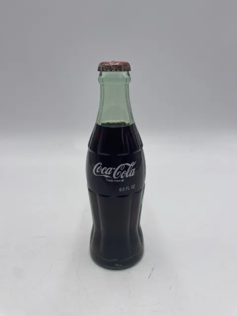 6.5 oz COCA COLA COMMEMORATIVE BOTTLE - 1990 INTERNATIONAL CHRISTMAS - GREECE