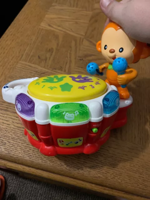 Baby beats monkey sales drum