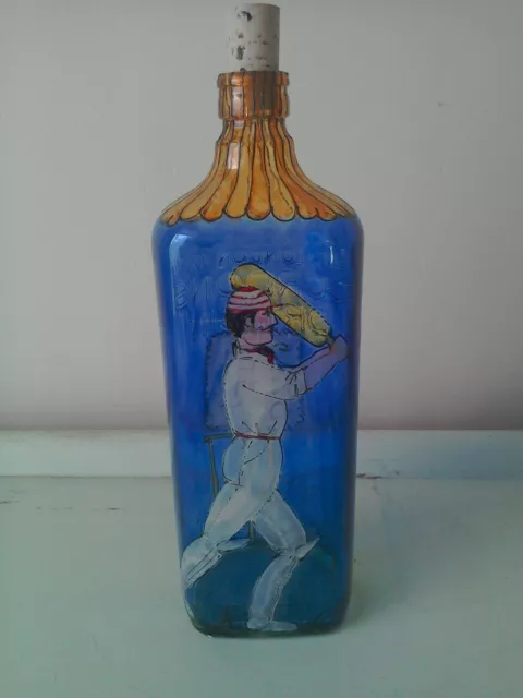 Unique bespoke recycled Gordon's Gin bottle decorated with a cricketer.