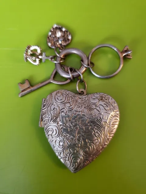 Antiqued Large Heart Locket with 4 charms Silver and Gold tone
