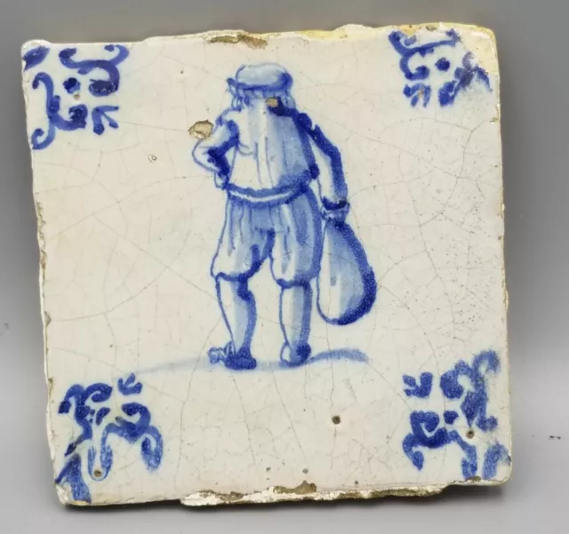 17th C  DUTCH DELFT TILE  WITH A MAN And SACK