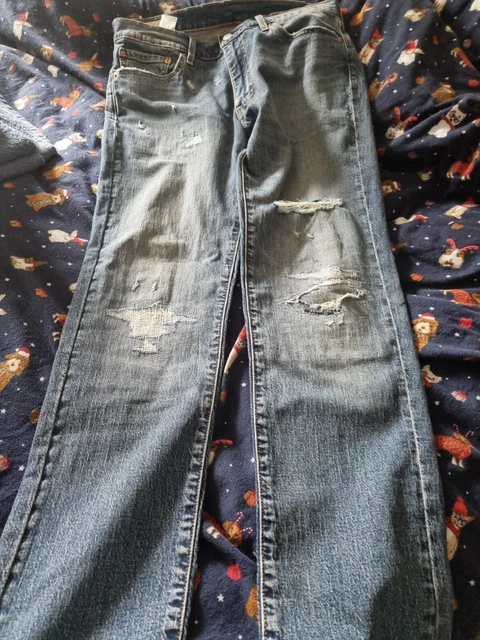 Jeans levis strappati uomo top