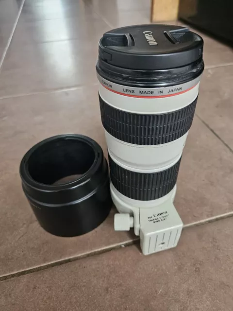 Canon 70-200 F/4L USM w/ hood and tripod mount.