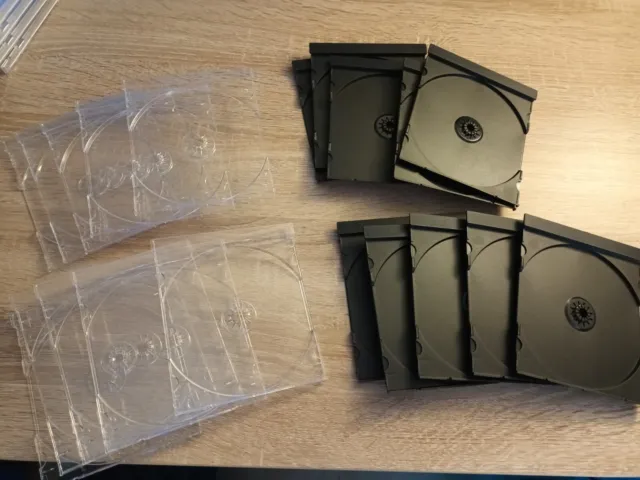 Pack 25 plateaux CD pour boitiers cristals transparents et noirs jamais utilisés