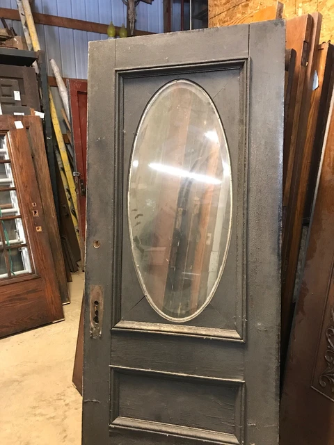 AN 563 antique oak three-quarter beveled oval Glassentry door 36 x 83