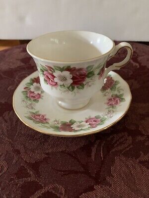 queen anne bone china cup and saucer with red/pink rose pattern 