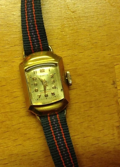 Ancienne Montre Femme EMCO Plaqué Or - Cadran à Aiguilles, Bracelet Tissu, Vintage En TB état