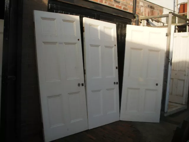 Very large and heavy reclaimed Georgian 6 panel pitch pine doors