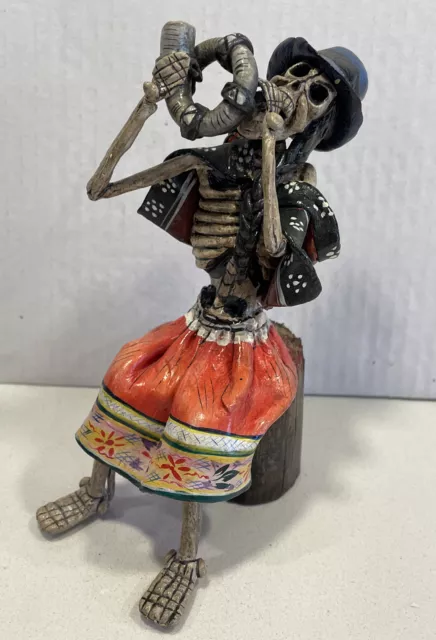 Claudio Jimenez Day of the Dead Skeleton Musician On A Log