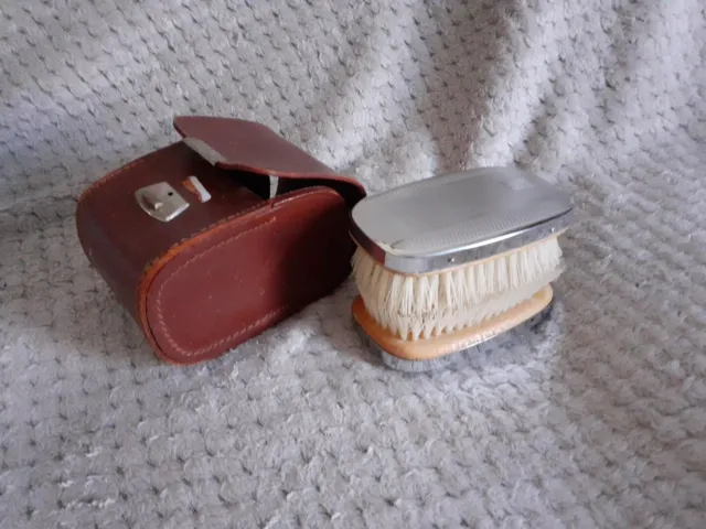 A Pair Of Vintage 1950s Chromium Plated Gentleman Brush In A Brown  Hide Case