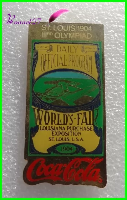 Pin's Coca cola JO OLYMPIAD 3e 1904 St Louis Daily Official Program # 1061