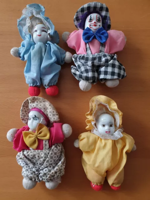 Lot de 4 poupées clowns tête en porcelaine 10x13 cm