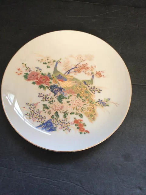 https://www.picclickimg.com/gaEAAOSw2C1jvB-3/Hand-Painted-Porcelain-Plate-Peacock-Design-Made-in.webp
