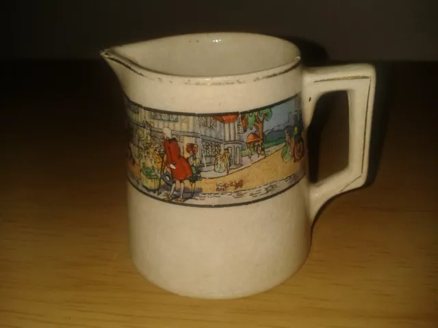 Vintage mini stoneware milk jug. Horse drawn carriage/street scene. (C5)