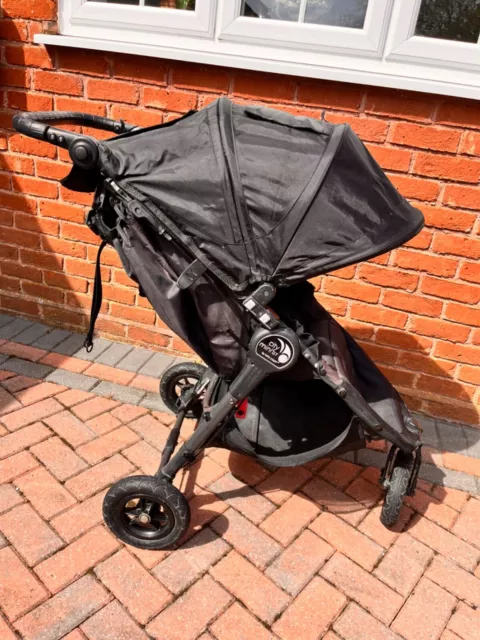 Baby Jogger City Mini GT single in black With Rain Cover