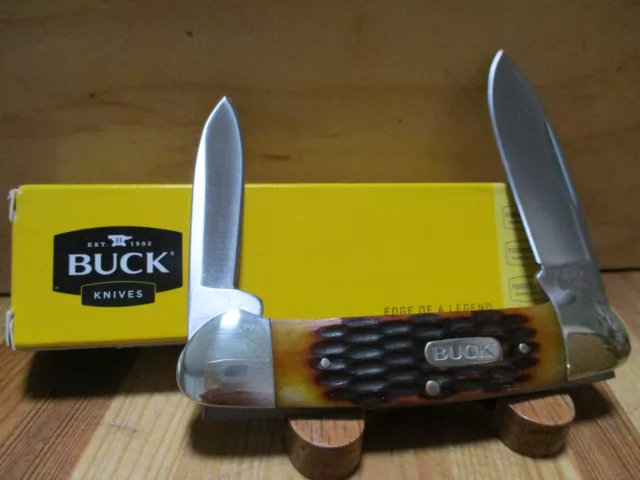 Buck Canoe 389 Folding Pocket Knife With Amber Jigged Handles