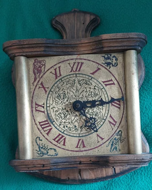 Orologio da parete antico in legno e ottone