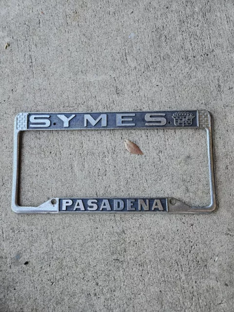 1960s Vintage Original Symes Cadillac Dealership License Plate Frame Pasadena Ca