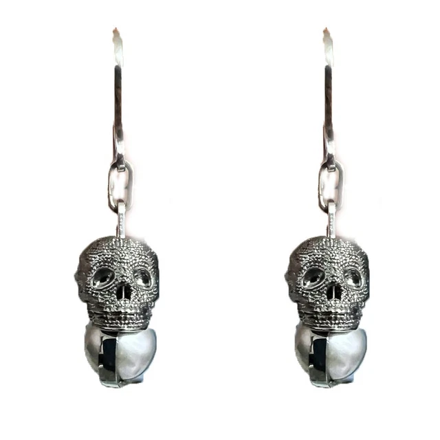 Orecchini a perno a forma di teschio extra piccoli in argento sterling con zirconi verde smeraldo - Italia