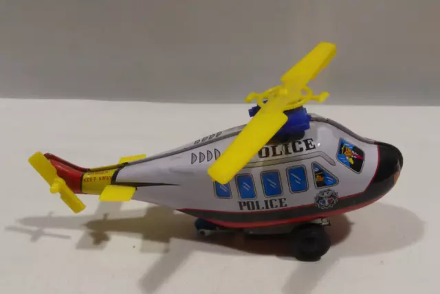 Hubschrauber aus Blech Police  Made in Korea  mit Schlüssel Blechspielzeug