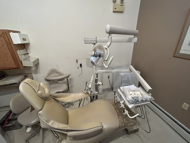 Dental Ez  Dental Chair with Adec delivery unit and midmark exam light
