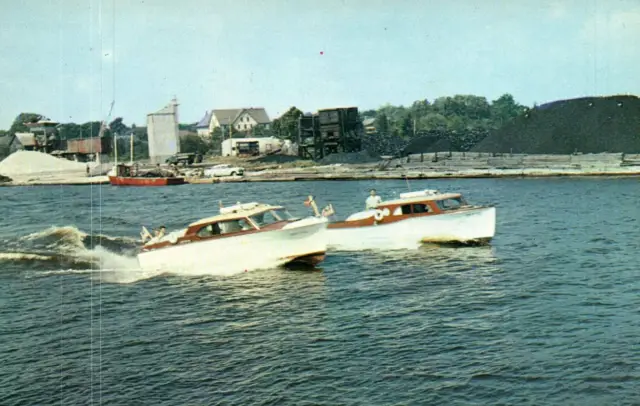 Manistique MI Boats Leaving Harbor For Lake Michigan Postcard