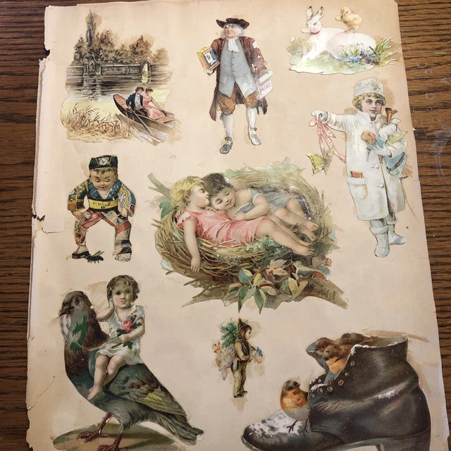 Página de libro de recortes troquelada de colección del siglo XIX con hermosas tarjetas y troquelados en ambos lados