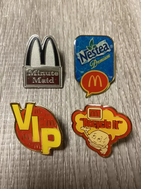 4 McDonald’s Lapel pins Various No dates