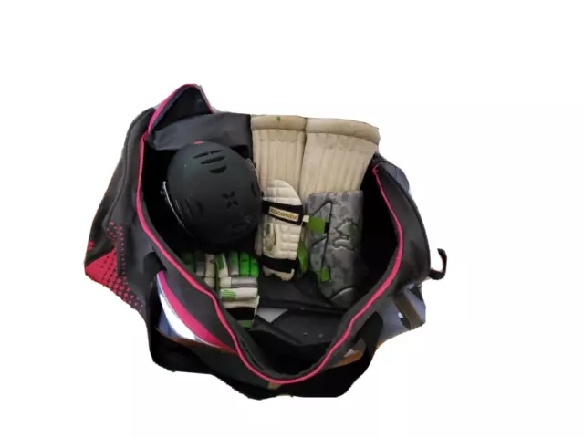 PUMA Senior Cricket Bag (with Wheels) and some gear including helmet.