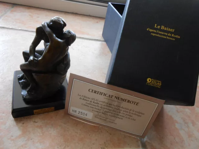 Statuette en bronze le baiser de Rodin avec boite ,socle et certificat numéroté