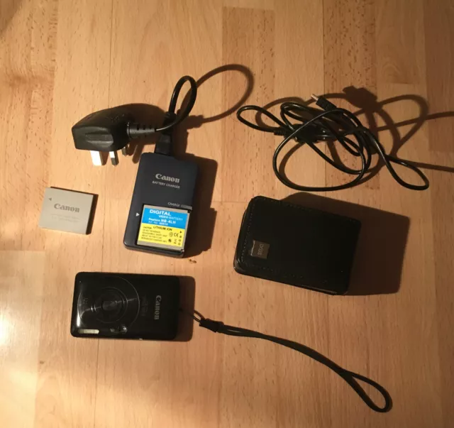 Canon IXUS 100 IS Digital Camera Charger X3 Batteries & A Case
