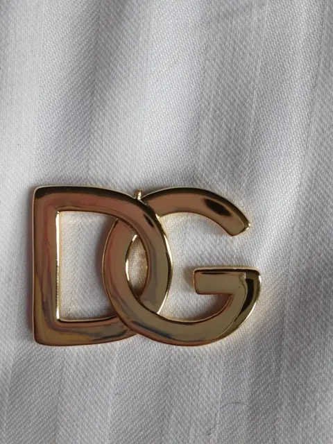 One Dolce & Gabbana 1 pieces   metal emblem gold Come from Earrings XL