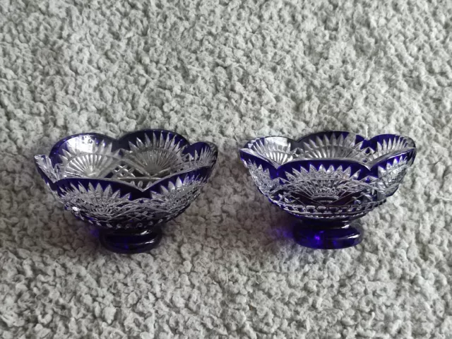 Two Cobalt Blue Cut TO Clear Crystal Glass Pedestal Bowl (there are small chips) Two Cobalt Blue Cut TO Clear Crystal Glass Pedestal Bowl (there are small chips)