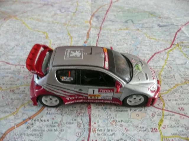 PEUGEOT 206 WRC n°1 Rallye Lyon Charbonnières 2005 (bernardi)  IXO 1/43