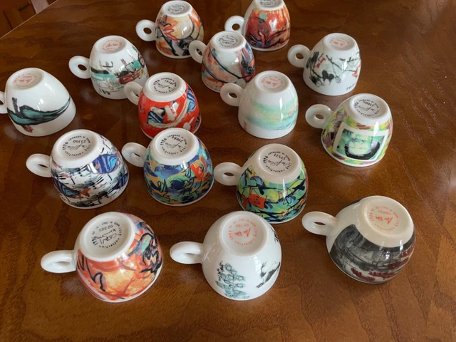 15 tazzine da caffe' collezione Illy 1996/1995 e 13 piattini bianchi 