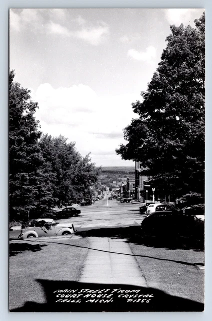 Vintage RPPC Crystal Falls MI Main Street from Court House Old Cars Business P20