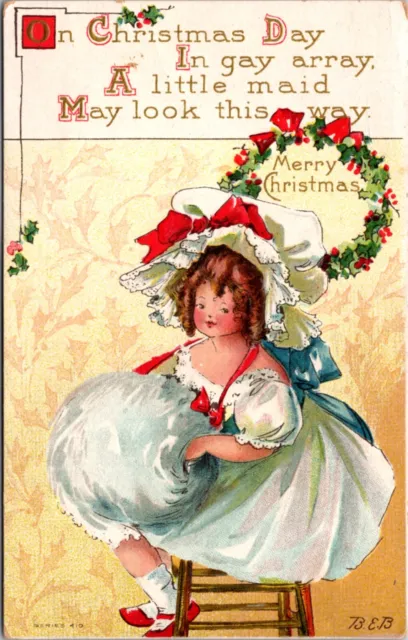 Merry Christmas Postcard Well Dressed Little Girl Sitting on Chair Holly Wreath