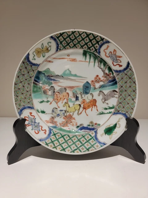A Kangxi Famille Verte “Eight Horses of Mu Wang” Plate, 1662-1722