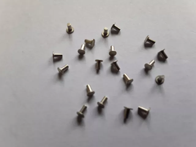 Rivetto testa piatta argento 3/64"" x 3/32"" nichel qty 20