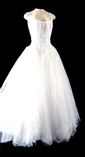 Couture Spaghetti Strap Wedding Gown Size 4. Alteration to re-size is included.