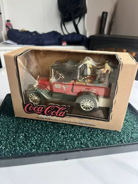 1997 The Coca-Cola Company Die-Cast 1918 Pickup With Porcelain Elf & Penguins