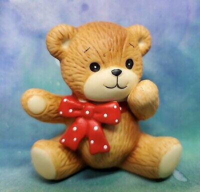Enesco Lucy and Me Lucy Rigg Red bow bear sitting one paw up