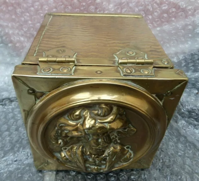 Antique Brass lined Tea/tobacco Caddy, hinged Lid with embossed soldier/Cavalier