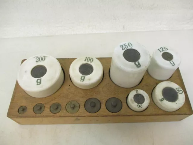 x-78026	Alter Porzellan/Messing Gewichtssatz 1-250g,mit Gebrauchsspuren