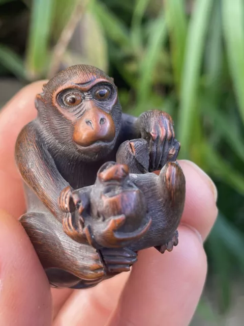 Hand carved wooden hot sale monkey