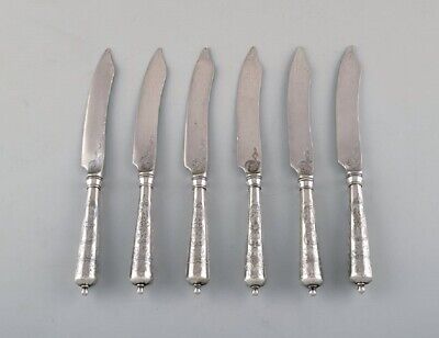 Danish silversmith. Six antique knives in silver (830) with flower chisels