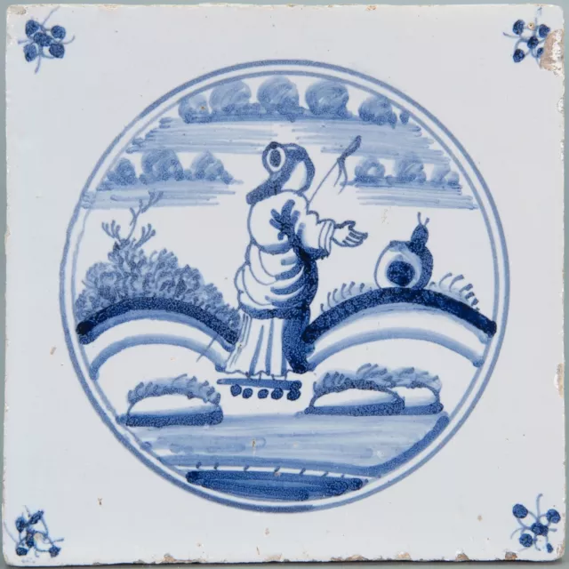 Dutch Delft Blue tile, shepherdess and a sheep in landscape, circa 1800.