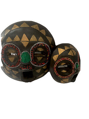 2 African Tribal Masks Wood Handcrafted in Ghana Black Gold Beaded Decorative