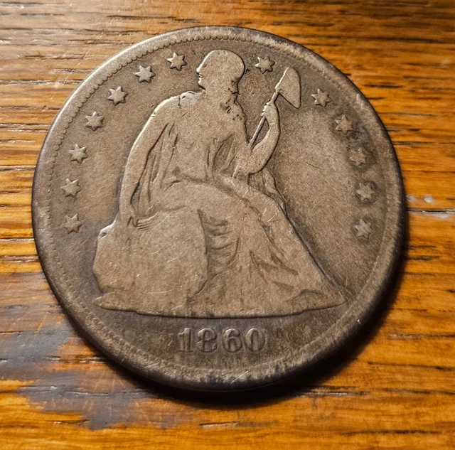 1860 O Seated Liberty Dollar Coin