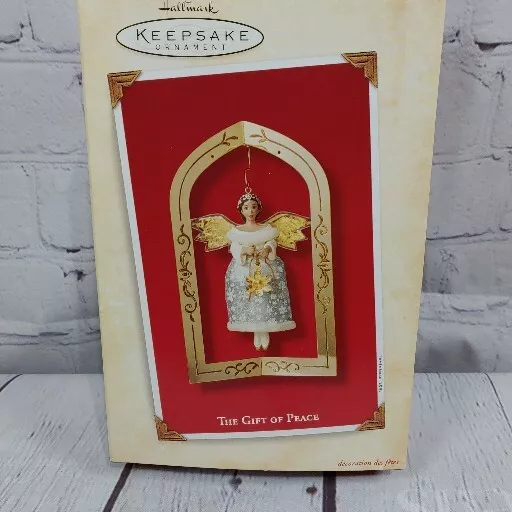 NIB-Hallmark Keepsake 2003 The Gift of Peace Angel Christmas Ornament with Stand